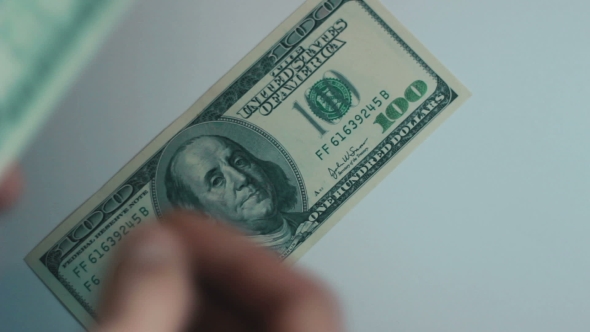 Man Recounts Money Hands 01