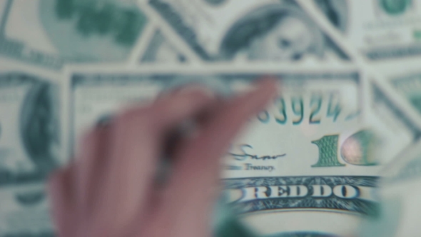 Cash Banknote Under The Magnifying Glass 01