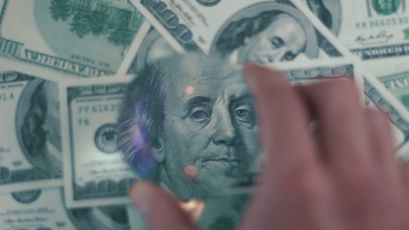 Cash Banknote Under The Magnifying Glass 03