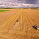 Closer Look of the Harvester and Truck on the Field - VideoHive Item for Sale