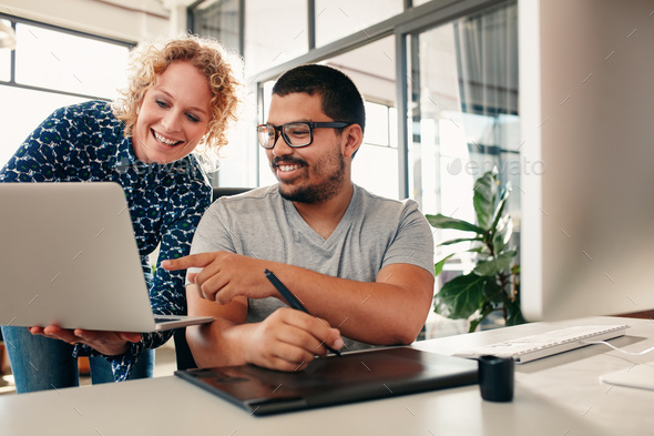 Creative people coworking on a new project in office - Stock Photo - Images