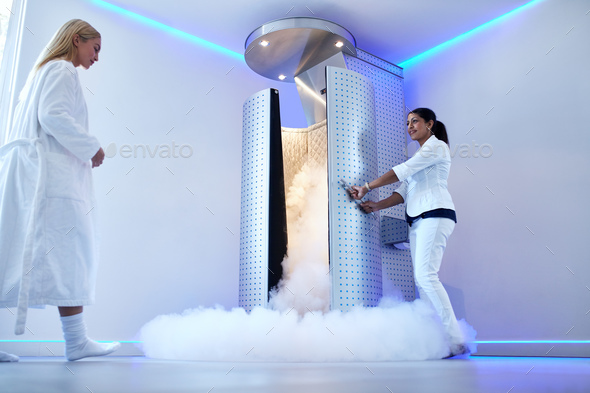 Woman going for whole body cryotherapy - Stock Photo - Images