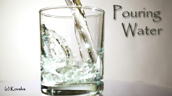 Pouring Water In The Glass 