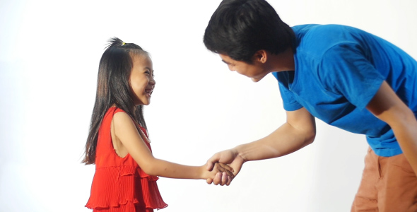 Young Man Handshake With Little Girl, Stock Footage | VideoHive
