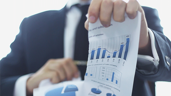 Businessman Rips Business Chart alt