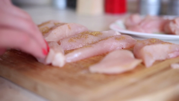 Young Woman Is Cooking In The Kitchen
