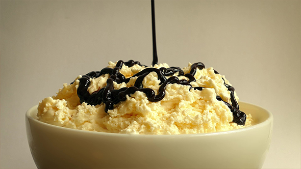 Bowl of Ice Cream and Chocolate Sauce alt