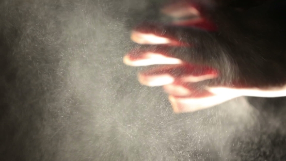 Hands Of a Woman Boxer Rubbing Hands Before The Fight Against The Dark Background