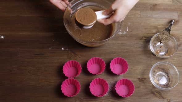 Cooking Muffins Adding And Mixing Chocolate