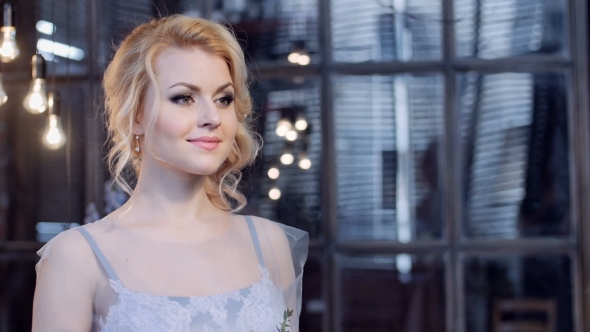 Beautiful Blonde Bride In Stylish Serenity Dress In a Loft Space