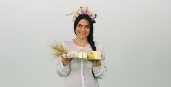 Woman Enjoying A Cheese Platter