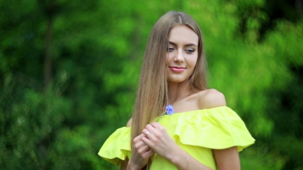 Young Beautiful Blonde Woman With Blue Eyes 