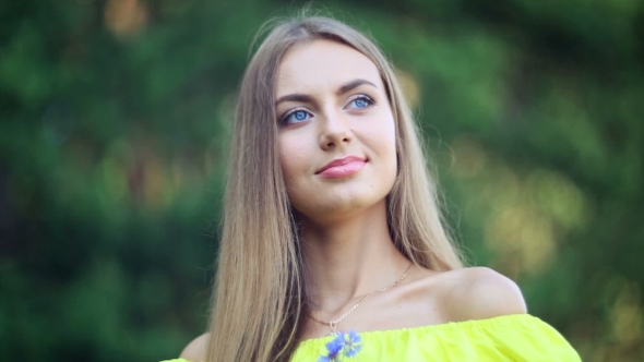 Young Beautiful Blonde Woman With Blue Eyes 