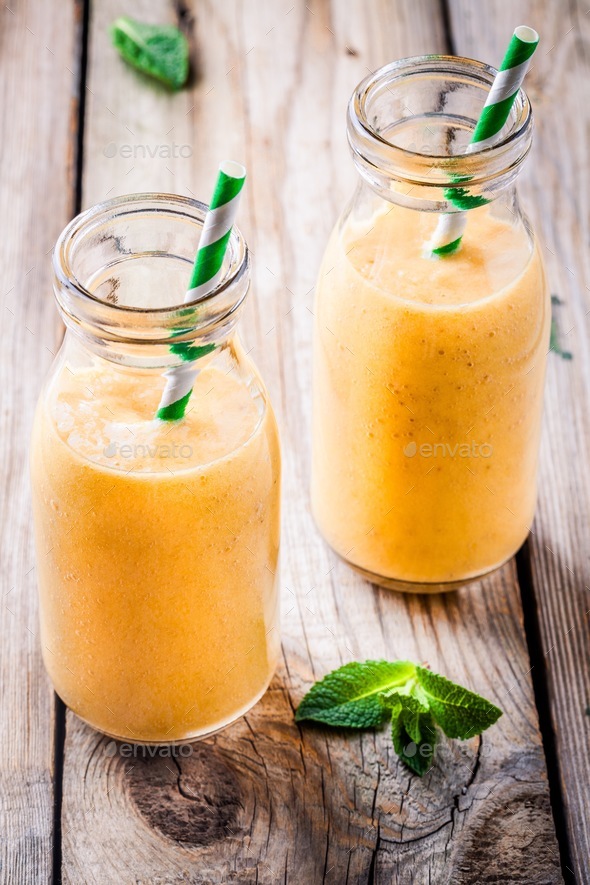 tropical smoothie in glass bottles