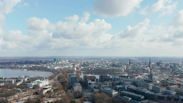 Panoramic Aerial View of Hamburg City Center with Church Spires Rising Above the Cityscape alt