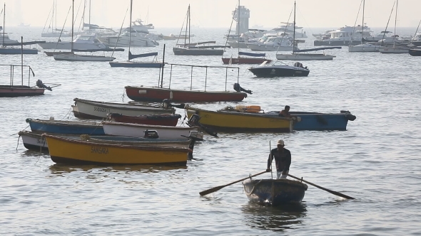 Tourist And Fisher Boats By The Harbour alt