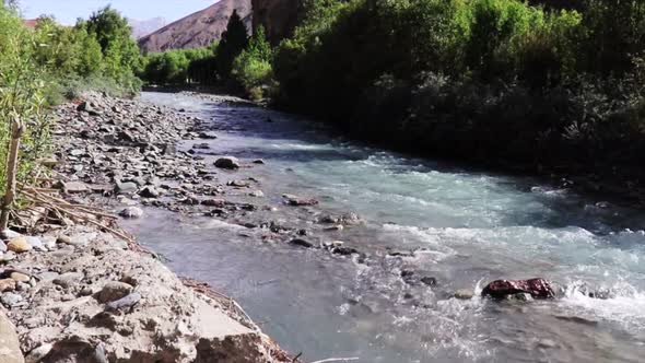 Running Water reservoir a pond river in hilly station of Kargil Ladakh. Landscape mountains and hill alt