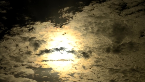  Of Dramatic Clouds Moving In Front Of The Sun