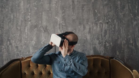Man Wearing Virtual Reality Goggles alt