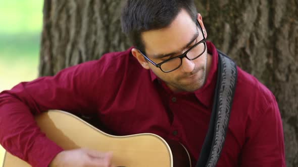 Man Playing Acoustic Guitar 2 alt