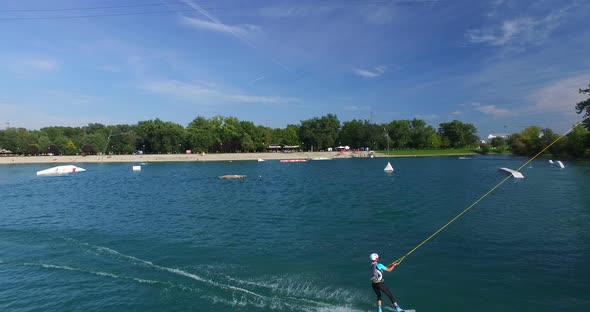 Woman Wakeboarding At Wake Park In Zagreb, Croatia Jarun alt