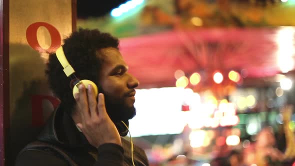 Man Shaking His Head To The Rhythm Of Music With Headphones 2 alt