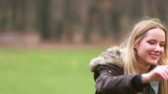Mom Playing With Husband And Daughter In Park alt