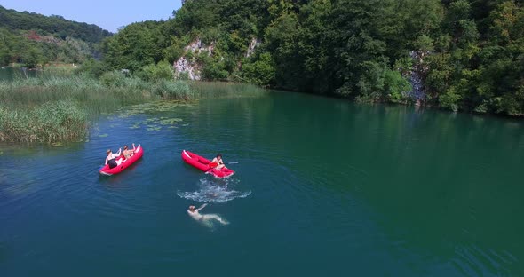 Friends Having Fun In Canoe On Mreznica River, Croatia 1 alt
