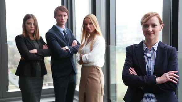 Portrait Of Beautiful Blonde Businesswoman, Colleagues In Background 1 alt