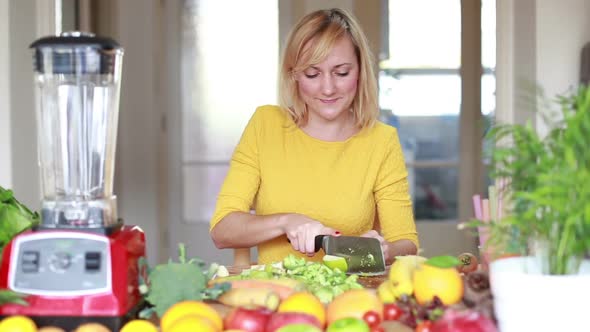Young Woman Cutting Apple Into Slices 1 alt