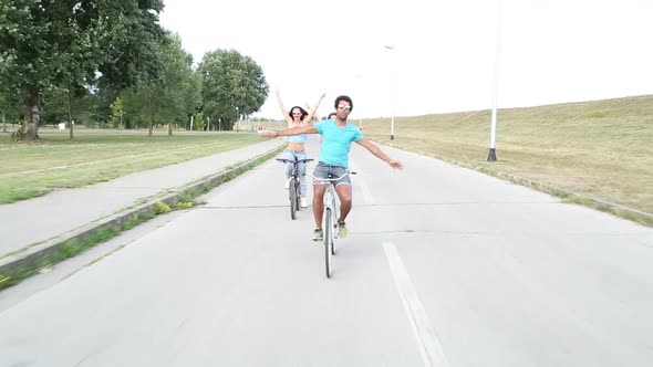 Group Of Friends Having Fun Cycling And Taking Selfies With Phone 2 alt