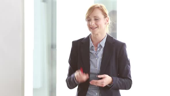 Beautiful Businesswoman Giving Presentation In Conference Room 1 alt