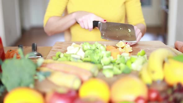 Woman Hands Cutting Lemon alt