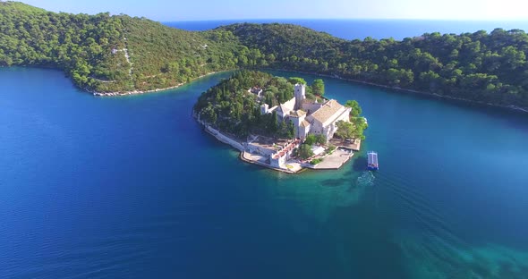 Aerial View Of Catamaran Arriving At St. Mary Island On Mljet Island, Croatia 1 alt