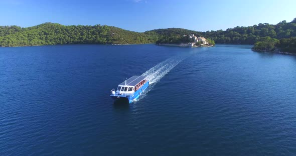 Aerial View Of Catamaran Sailing Off St. Mary Island On Island Of Mjlet, Croatia 3 alt