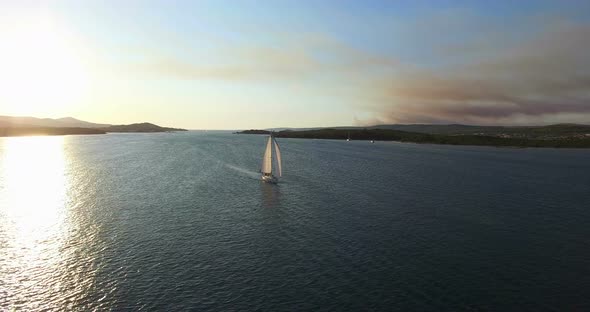 Aerial View Of Yacht Sailing Beside Galesnjak Island At Sunset, Croatia 2 alt