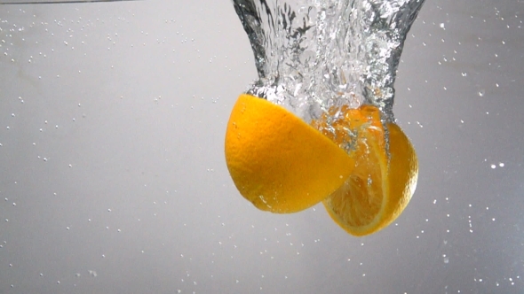 Parts Of Orange Drops Under Water, Stock Footage | VideoHive