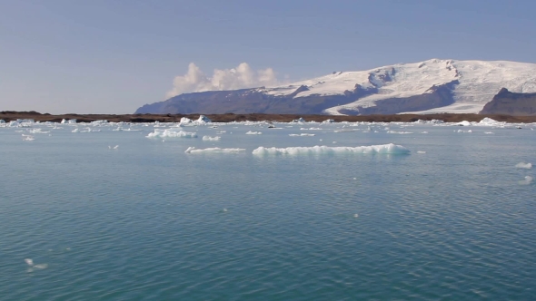 Camera Moves Across Jokulsarlon To Vatnajokull Glacier Iceland 