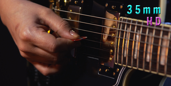 Hand Playing An Electric Guitar 20