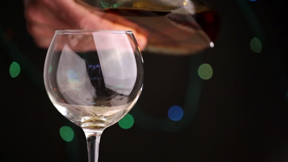 Pouring Brandy From a Bottle alt