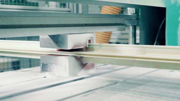 Factory Machine is Polishing a Fiberglass Item alt