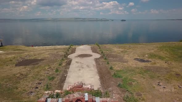 Historical Area on Shore of Wide River, Old Brick Gate, Aerial View