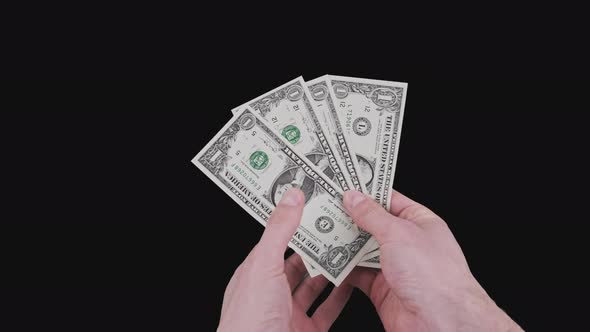 Male Hands Show Several One Dollar Bills with Alpha Channel alt