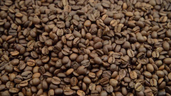 Roasted coffee beans. Coffee beans close up.