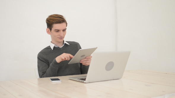 Happy Freelancer Working Relax In Studio alt