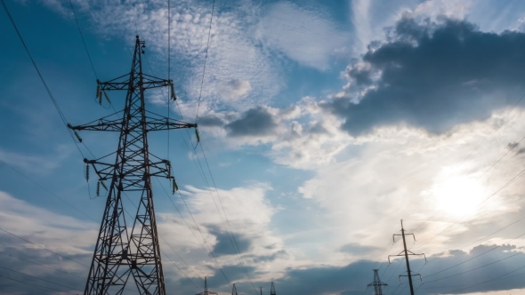 energy tower at sunset. clouds timelapse. technology solar. electrical wire alt