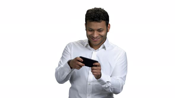 Funny Businessman Playing Game on His Phone alt