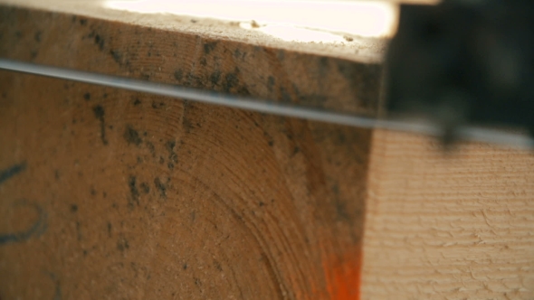 Wood Cutting Machine Board Log In a Sawmill alt