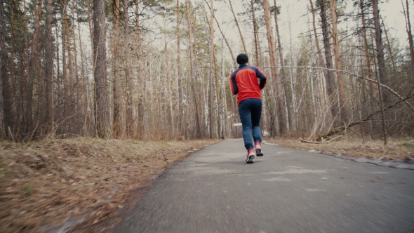 Man Running In Forest Woods Training alt