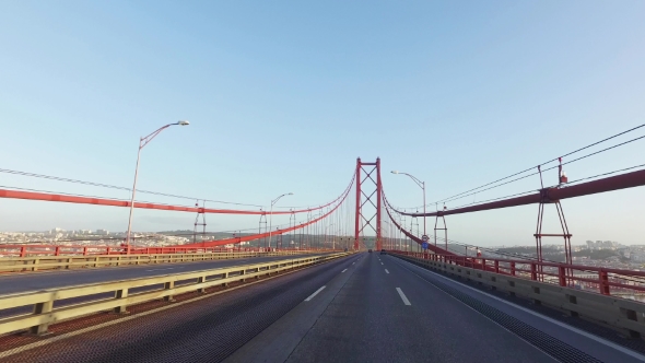 Driving On a 25 De Abril Bridge In Lisbon